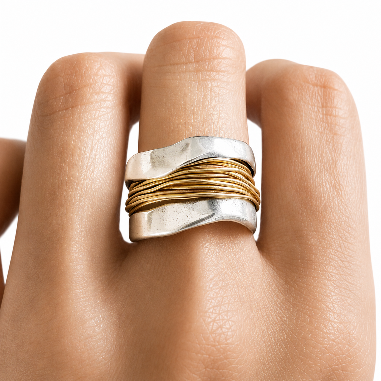 Silver ring with golden threads