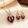 Gold Ruby Twisted Heart Jewelry Set