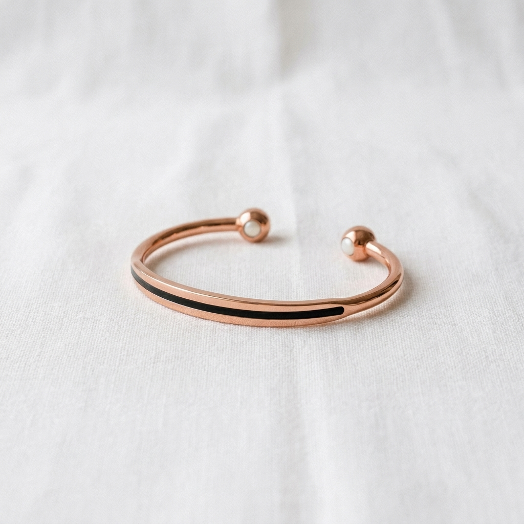 Vera's Vein Copper Bracelet on white linen background