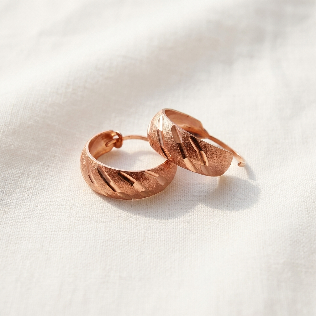 Vera's Vale Copper Earrings on white linen background