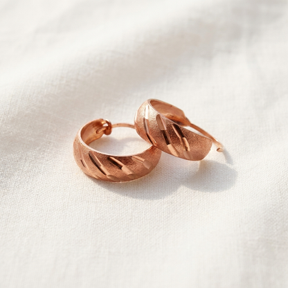 Vera's Vale Copper Earrings on white linen background