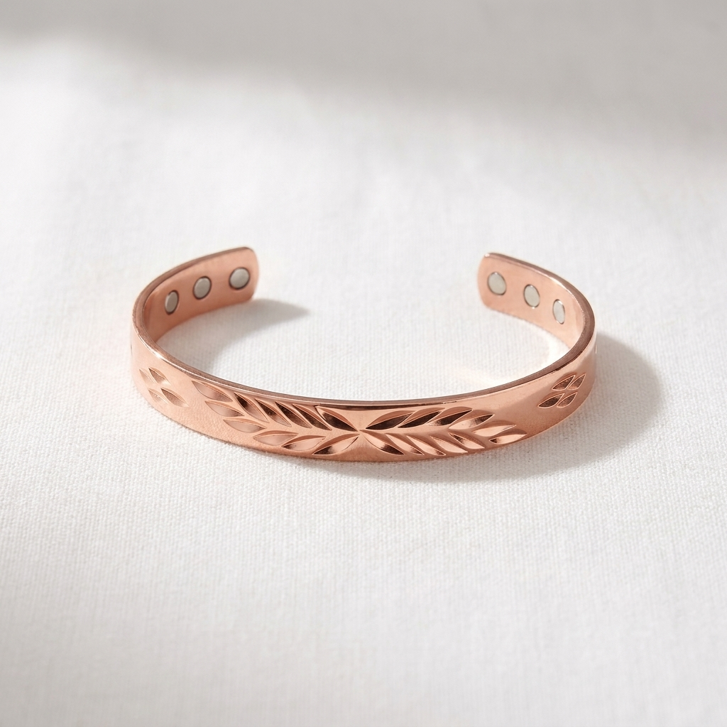 Vera's Lunar Copper Bracelet on white linen background